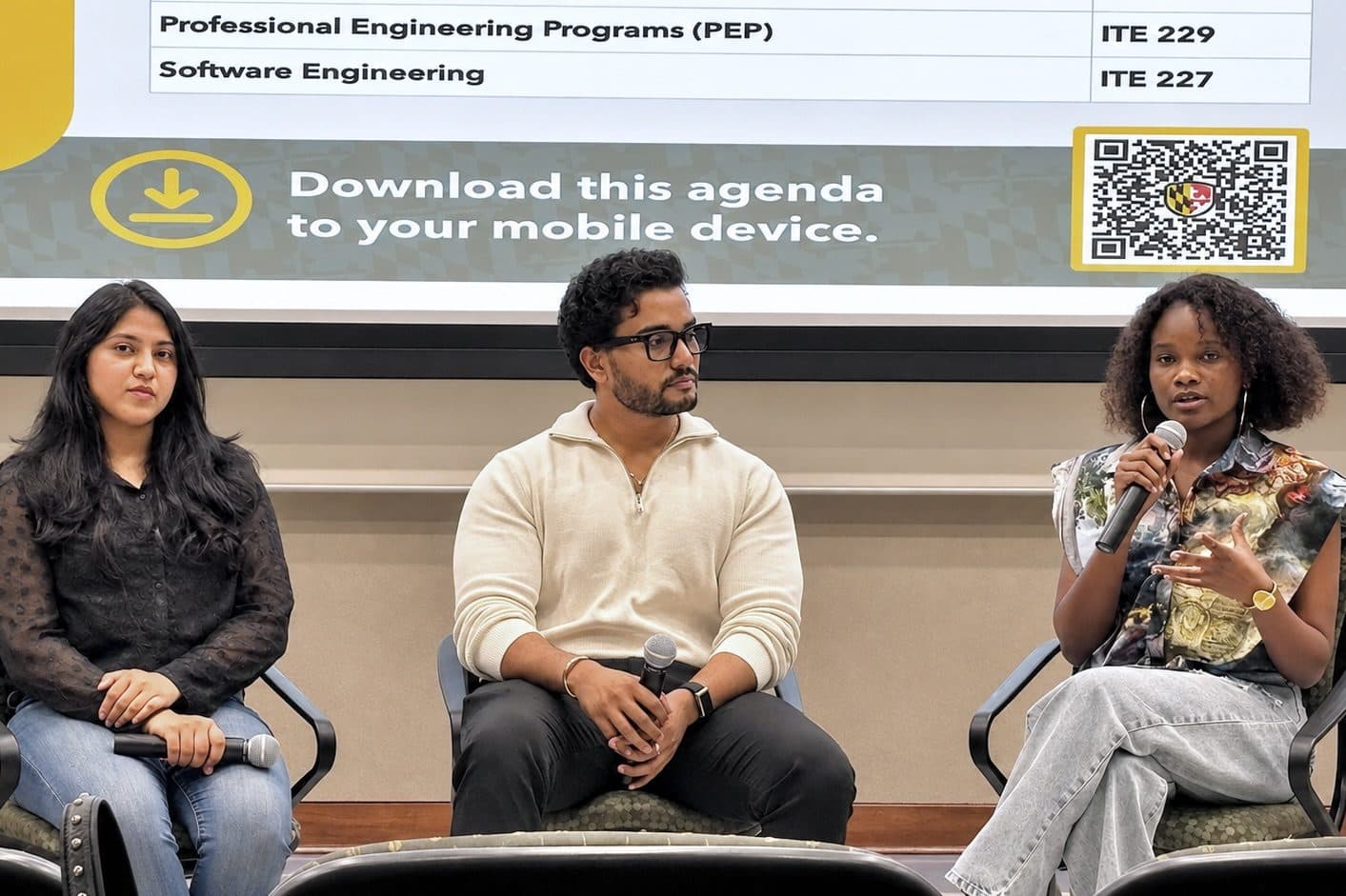 Manikanta seated with fellow student panelists at UMBC orientation